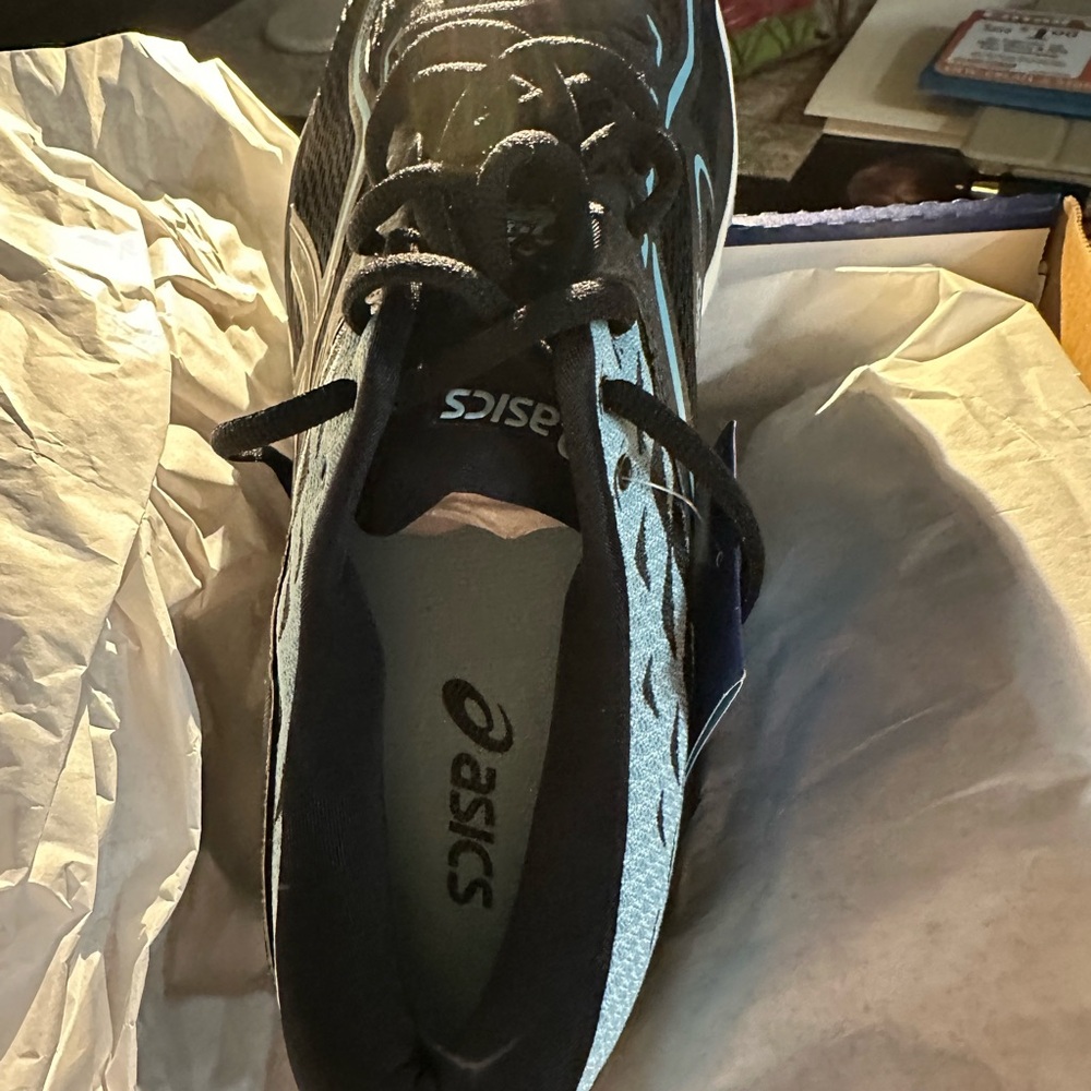 Asics Black Athletic Shoes with Breathable Mesh and Cushioned Sole